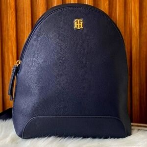 New Tommy Hilfiger black backpack with blue and white belt